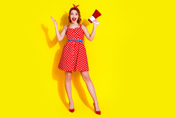 Photo of cheerful adorable cute lady wear red trendy clothes isolated on yellow color background