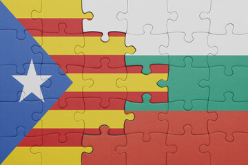 puzzle with the colourful national flag of bulgaria and flag of catalonia.