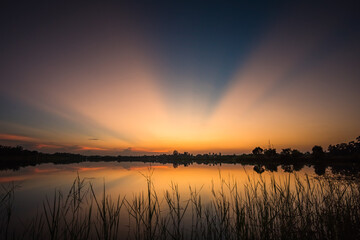 Obraz premium Sunset on the lake landscape