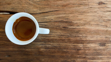 cup of coffee on wooden table