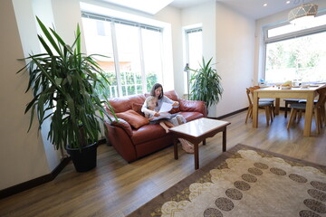 Mother and a child reading at home