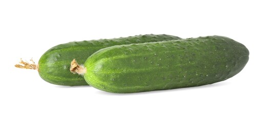 Two fresh green cucumbers isolated on white