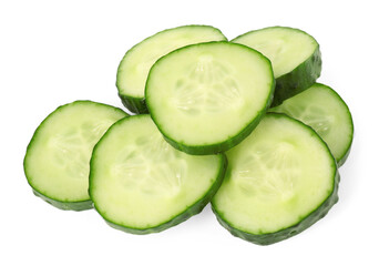 Pile of fresh cut cucumber slices isolated on white