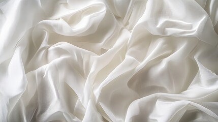 Obraz premium Artistic close-up macro image of crumpled white fabric, capturing the intricate details and soft texture with gentle lighting for a sophisticated and elegant background.