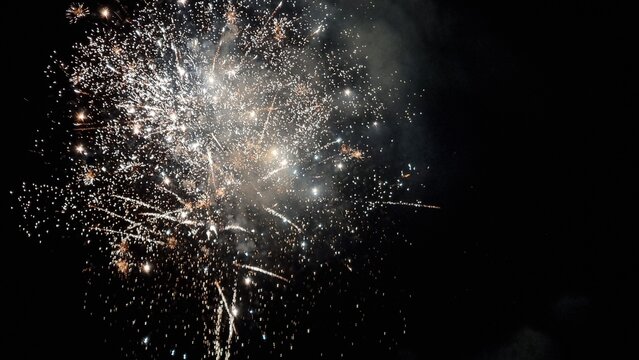 fireworks explosions in the night space for your text background - Powered by Adobe