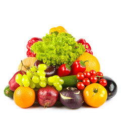 Healthy vegetables and fruit on a plate isolated on white.