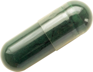 Green herbal medicine capsule isolated on white background