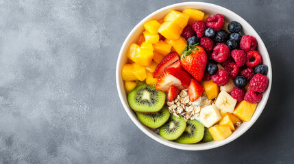 A bowl of fresh fruit salad, muesli, and Greek yogurt on a gray background with space for text. --ar 16:9 --v 6.1 Job ID: 91490ee3-b6d4-4ea9-ac51-13ce2c6ff79e