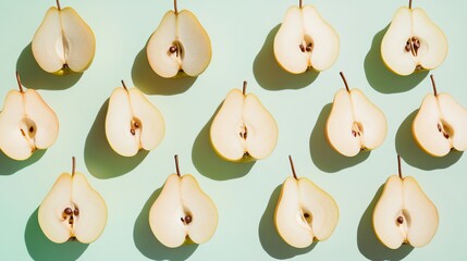 Pear halves arranged in a pattern on a light green background.