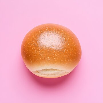 pampushka bun isolated on pink background top view 
