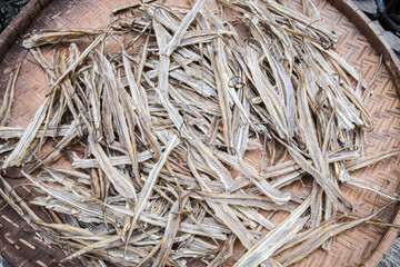 Dried Anchovies Piled High on Wicker Basket