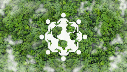 World environment day, Teamwork and partnership concept. An aerial view of green forest with a symbol of people holding hands around the globe, representing global environmental responsibility. ESG.