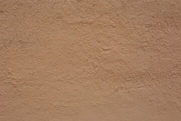 Soil wall texture of clay house structure. Mud background