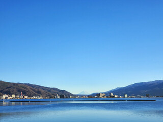 This picture shows Mt. Fuji and Lake Suwa.