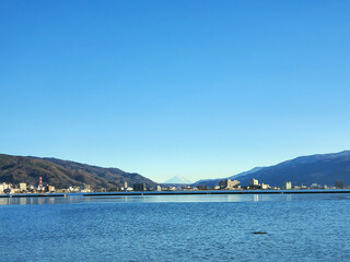 This picture shows Mt. Fuji and Lake Suwa.