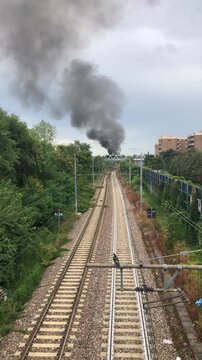 Video of a Fire Over the Railway in the Outskirts of Milano, Italy, During a Hot Summer Day