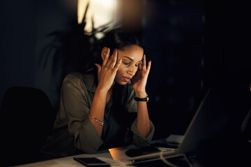 Woman, journalist and headache in burnout at computer, office and night for deadline, research or publication. Female person, tech and creative with tension, strain or stress as editor in news agency