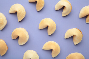 Traditional fortune cookies on purple background