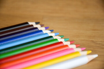 Color palette of wooden crayons