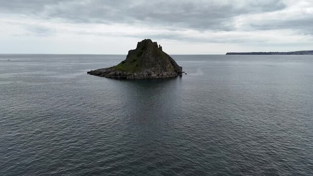 Thatcher Rock seen from clifftip footpath in Wellswood, Torquay, Devon, UK