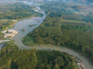 Aerial view morning sunrise with fog river tropical rainforest mountain