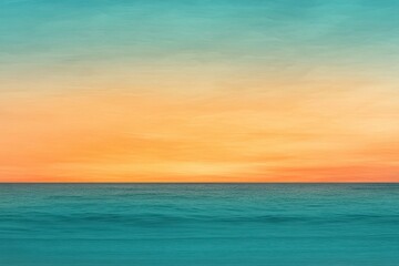Fototapeta premium A gradient moving from a warm orange to a cool teal with a subtle grain effect, resembling a sunset over the ocean.
