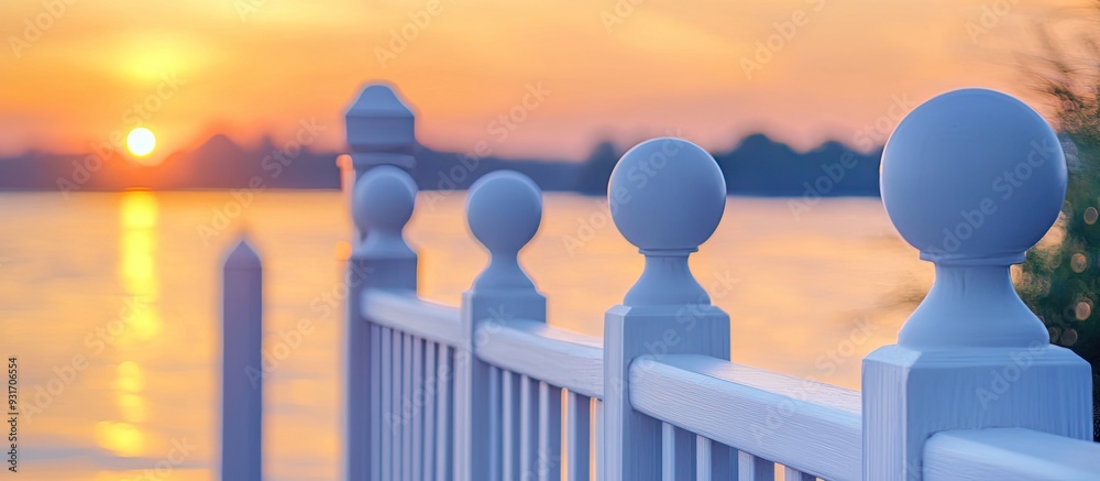 Aufkleber a white classic fence frame during evening sunset on the river shore waterfront district suitable fo