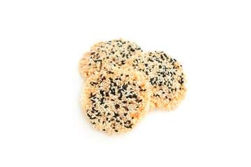Rice cracker with sugar cream and white sesame and black sesame toppings isolated on white background, Homemade biscuits, Thai name is Khao Tan