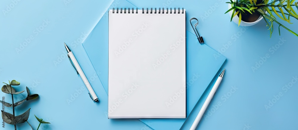 Wall mural White notebook with a blank page and copy space