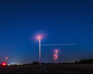 wind turbine farm at night 