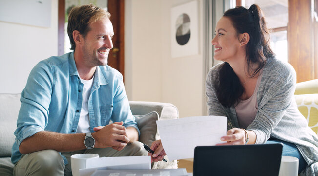 Couple, happy and relax with documents at house for tablet, financial planning and debt payment of mortgage. Man, woman and paperwork for budget savings, property insurance and asset management