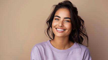 Fototapeta premium Young Woman Smiling In Light Purple Sweater Against Beige Background