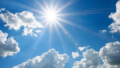 Vibrant Blue Sky With White Fluffy Clouds and Bright Shining Sun on a Perfect Summer Day Background