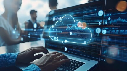 Team Collaborating on Laptop with Cloud Computing Hologram and Data Visualizations in Modern Office