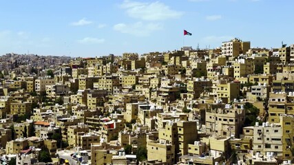 Aerial View of Amman, Jordan, Showcasing Historic Brownstone Buildings in an Urban Landscape. Action
