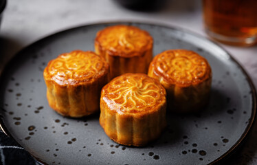 Moon cakes with nuts filling in a plate