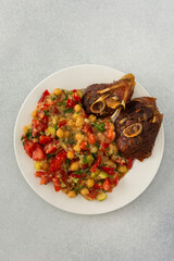 Delicious hearty lunch or dinner, chickpea stew with stewed vegetables, roasted turkey and hummus, healthy delicious food