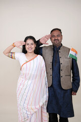Playful couple wrapped in an Indian flag, celebrating their vibrant heritage with joy and affection. Perfect for showcasing cultural pride, unity, and festive spirit.