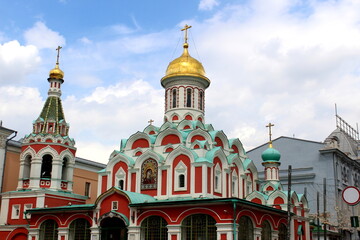 Fototapeta premium Temple with golden domes against the sky on a summer day. 
