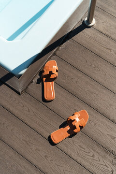 MINSK, BELARUS - JULY 23, 2024: Oran sandal Hermes near the pool
