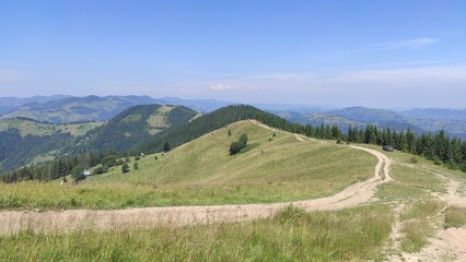 Fototapeta premium mountains in summer, carpathians, beautiful view of mountains and houses in mountains, countryside