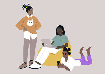 Teenagers engage in digital projects and conversation while relaxing in a vibrant setting, showcasing creativity and connection