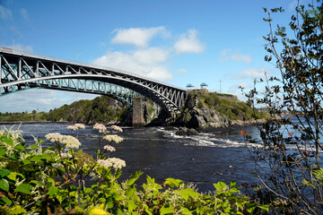 Old bridge over the reversing falls in the Bay of Fundy New Brunswick Canada