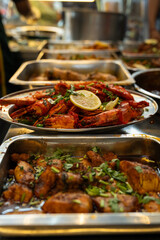 Indian dish Biryani chicken with basmati rice in metal brass old bowl, basmati rice with chicken, street food in Penang.