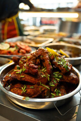 Indian dish Biryani chicken with basmati rice in metal brass old bowl, basmati rice with chicken, street food in Penang.