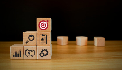 Pyramid wooden cubes. Business goal, plan. wood cube block with information technology business wood cube concept is to develop skills, knowledge. Business strategies achieving goals and challenge.