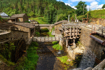 Set of old wooden mills that take advantage of the water of the river to grind grain, Taramundi, Asturias. © josemiguelsangar