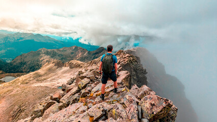 A mountaineer enters the valleys of Pico Eriste, where the peaks of the Eristes and the ibones of Bagüeñola combine with the rich vegetation to offer a unique experience in Huesca.