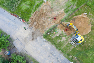 Storm sewer pipes laying. Building construction on Construction site. Water main and sanitary sewer...