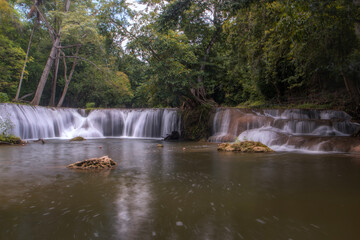Fototapeta premium Chet Sao Noi Waterfall, or Namtok Chet Sao Noi , a seven tiers of small and beautiful waterfall in Namtok Chet Sao Noi National Park, Saraburi Thailand.